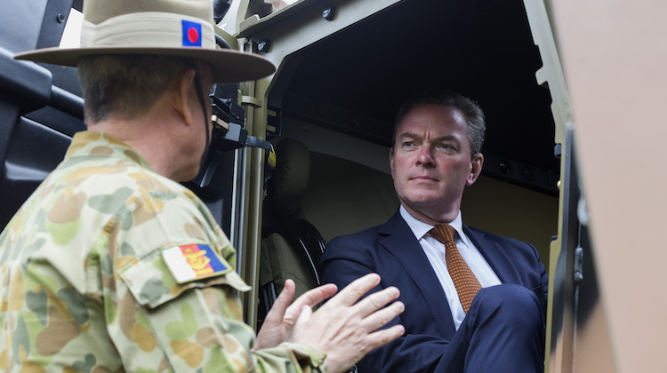 Minister for Defence Industry, the Honourable Christopher Pyne MP is briefed on the Hawkei vehicle by Australian Army officer Lieutenant Colonel Chad Stonier at Victoria Barracks, Melbourne on 14 November 2016.