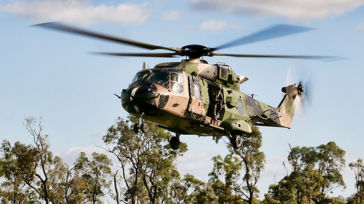 A Multi Role Helicopter (MRH-90) Taipan transports troops during the 3rd Brigade Combined Arms Training Activity (CATA) at the Townsville Field Training Area on 12 June 2014. Comprising nearly 400 personnel, the aviation battlegroup for the CATA consisted of a troop of Armed Reconnaissance Helicopter Tigers from the 1st Aviation Regiment's 161st Squadron, and a troop of MRH-90 Taipans, a troop of S-70A-9 Black Hawks, and a troop of CH-47D Chinooks from each of the 5th Aviation Regiment squadrons.