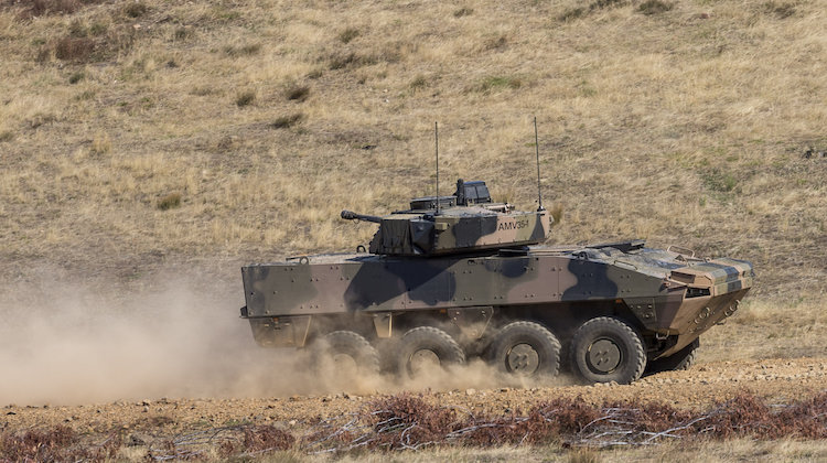 A BAE Systems Australia Patria AMV35 drives off of the Armoured Fighting Vehicle Field Firing Training Area at Puckapunyal Range, Victoria, while participating in the Land 400 Risk Mitigation Activity on 22 February 2017.