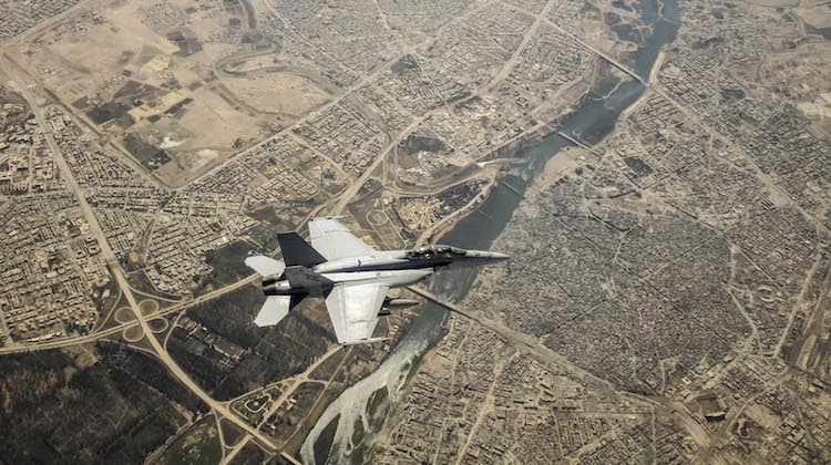 A Royal Australian Air Force F/A-18F Super Hornet flies over Mosul, Iraq, during an Operation OKRA mission.