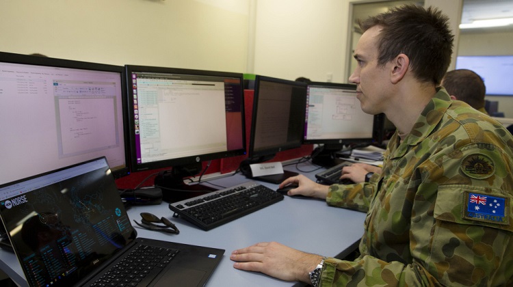 Lance Corporal Anthony Neale, of the Defence Force School of Signals, studies cyber defence operations while attending the University of New South Wales Canberra Cyber Operations course run by the Australian Centre for Cyber Security at Australian Defence Force Academy in Canberra. *** Local Caption *** With cyber security moving to the peak of global political and defence agendas as well as recent front-page news, advanced training is continuing for personnel who will work in Armys new cyber security roles. A group of Army members are attending the University of New South Wales Canberra cyber operations courses run by the Australian Centre for Cyber Security at Australian Defence Force Academy, which began on 12 September and will finish on 23 November, 2017. Coming from varied corps, the students challenged themselves during the all-rank course in subjects covering passive and active cyber defence operations. The course will assist soldiers to incorporate cyberspace considerations into planning and operations while reinforcing the importance of security and defensive measures.