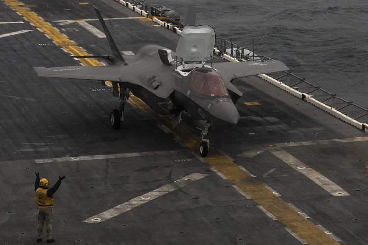 180305-M-GT736-033 EAST CHINA SEA (March 5, 2018) An F-35B Lightning II touches down on the USS Wasp (LHD 1), marking the F-35B’s first operational deployment with a Marine Expeditionary Unit. Marine Fighter Attack Squadron 121 is embarked aboard Wasp for the 31st Marine Expeditionary Unit’s Spring Patrol 2018. (U.S. Marine Corps photo by Cpl. Bernadette Wildes/Released)