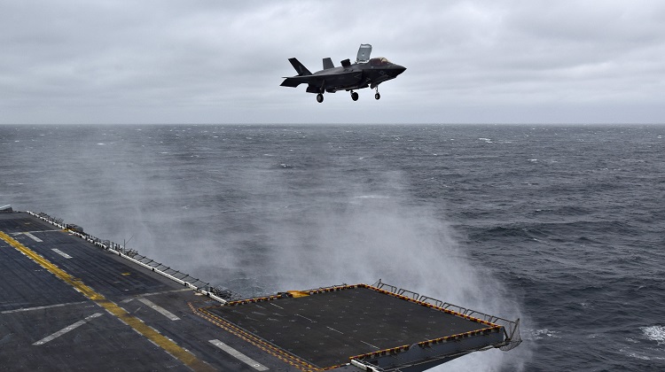 180305-N-RI844-0327 EAST CHINA SEA (March 5, 2018) An F-35B Lightning II with Marine Fighter Attack Squadron (VMFA) 121 touches down on the amphibious assault ship USS Wasp (LHD 1), marking the first time the aircraft has deployed aboard a U.S. Navy ship and with a Marine Expeditionary Unit in the Indo-Pacific. VFMFA-121, assigned under the Okinawa-based 31st Marine Expeditionary Unit, will remain embarked aboard Wasp for a regional patrol meant to strengthen regional alliances, provide rapid-response capability, and advance the Up-Gunned ESG concept. (U.S. Navy photo by Mass Communication Specialist 2nd Class Daniel Barker/Released)