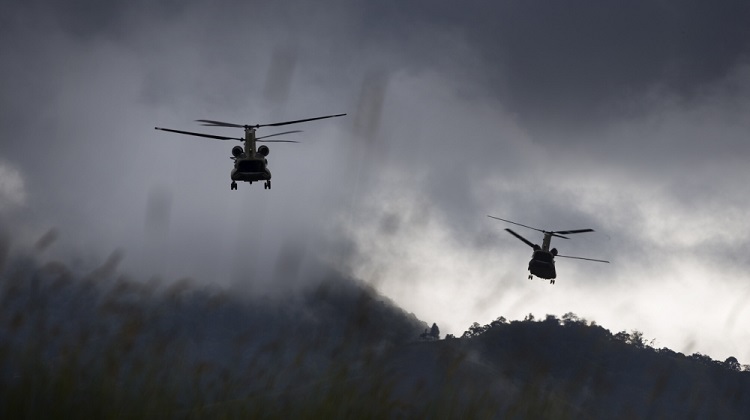 Two Australian Army CH-47F Chinook helicopters depart from Mount Hagen Airport during Operation PNG Assist 2018. *** Local Caption *** Three Australian Army CH-47F Chinook aircraft from Townsville based 5th Aviation Regiment have begun ferrying essential supplies to remote areas of Papua New Guinea affected by a 7.5 magnitude earthquake which struck on 26 February 2018. Operation PNG Assist 2018 is the ADF contribution to the DFAT led, Whole of Australian-Government response to the earthquake. The Boeing CH-47F Chinook is the largest helicopter in the Australian Army, and is one of the most versatile.