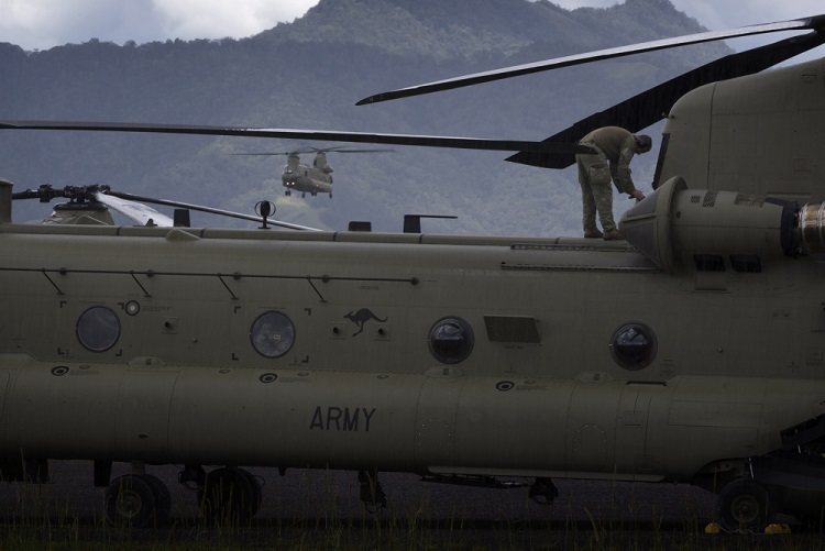 An Australian Army CH-47F Chinook helicopter returns to Mount Hagen Airport during Operation PNG Assist 2018. *** Local Caption *** Three Australian Army CH-47F Chinook aircraft from Townsville based 5th Aviation Regiment have begun ferrying essential supplies to remote areas of Papua New Guinea affected by a 7.5 magnitude earthquake which struck on 26 February 2018. Operation PNG Assist 2018 is the ADF contribution to the DFAT led, Whole of Australian-Government response to the earthquake. The Boeing CH-47F Chinook is the largest helicopter in the Australian Army, and is one of the most versatile.