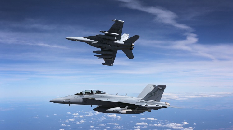 A pair of Royal Australian Air Force EA-18G Growlers en route to the Australian Air Show in Avalon. *** Local Caption *** The Australian Defence Force is proud to be part of the 2017 Australian International Airshow - the premier event in the Southern Hemisphere for showcasing aerospace industry and military aviation.