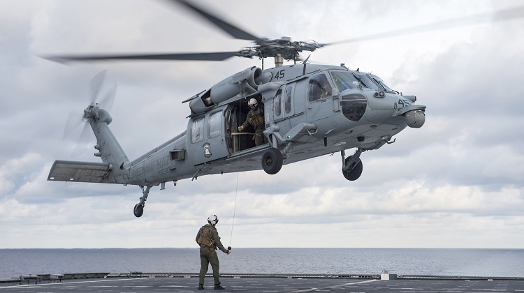 170701-N-PD309-204  SULU SEA (July 1, 2017) Sailors assigned to the "Wildcards" of Helicopter Sea Combat Squadron 23 prepare to hoist a dummy on a litter into an MH-60S Seahawk during a medical drill aboard the littoral combat ship USS Coronado (LCS 4). Coronado is on a rotational deployment in U.S. 7th Fleet area of responsibility, patrolling the region's littorals and working hull-to-hull with partner navies to provide U.S. 7th Fleet with the flexible capabilities it needs now and in the future. (U.S. Navy photo by Mass Communication Specialist 3rd Class Deven Leigh Ellis/Released)