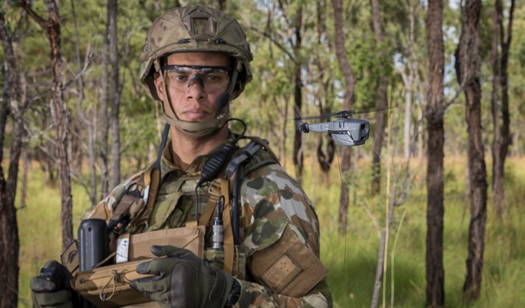 Australian Army soldier Trooper Sam Menzies deploys a PD-100 Black Hornet Nano unmanned aircraft vehicle during training exercise at Shoalwater Bay Training Area, Queensland, on 4 May 2018. *** Local Caption *** Australian Army soldiers from 2nd/14th Light Horse Regiment (Queensland Mounted Infantry) demonstrated the PD-100 Black Hornet Nano unmanned aircraft vehicle during a training exercise at Shoalwater Bay Training Area, Queensland, on 4 May 2018. The Australian Army Headquarters (AHQ) Unmanned Aerial Systems (UAS) Sub Program, in conjunction with the 7th Combat Brigade (7 BDE) are supporting the initial issue of the Black Hornet Nano UAS across an Australian Army Brigade. The Australian Army is the biggest user of Nano UAS in the world and is also the first Army to purchase and issue this technology to conventional forces down to Platoon level, the upcoming completion of the Nano UAS Black Hornet rollout to 7 BDE is a noteworthy achievement and key capability milestone. The Nano UAS Black Hornet roll out to 7 BDE aligns with the Chief of Armys modernisation efforts, and provides a highly visual opportunity to showcase UAS and 7 BDE personnel, equipment and UAS training methodology to key stakeholders.