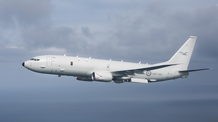 A RAAF P-8A Poseidon supports sea trials for the NUSHIP Hobart in the Gulf St Vincent off the coast of Adelaide.
